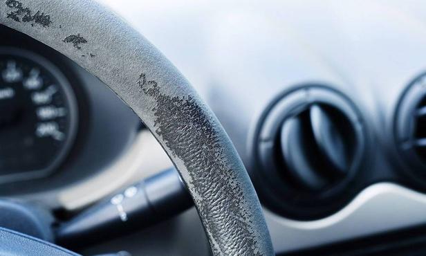 A worn-out steering wheel on a low mileage van can indicate a hidden vehicle past